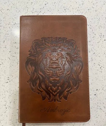Brown Bible personalized with a full-cover lion design