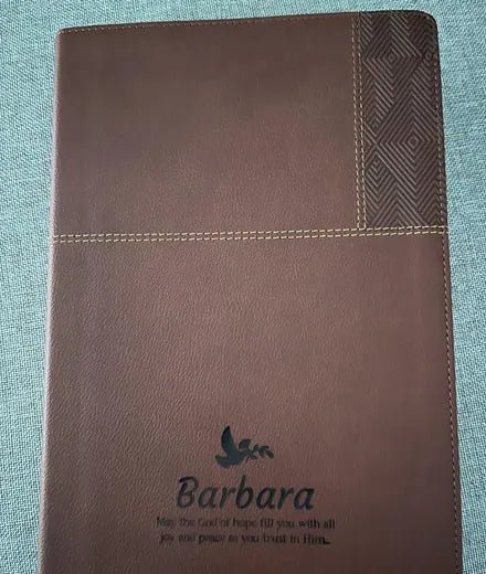 Brown Bible personalized with a name and dove