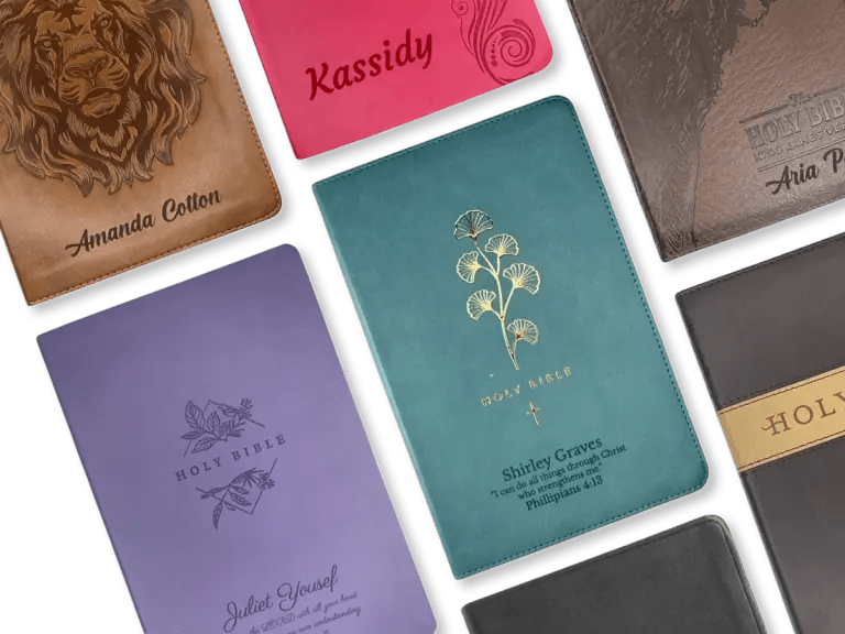 A colorful collection of personalized Bibles with engraved names and designs