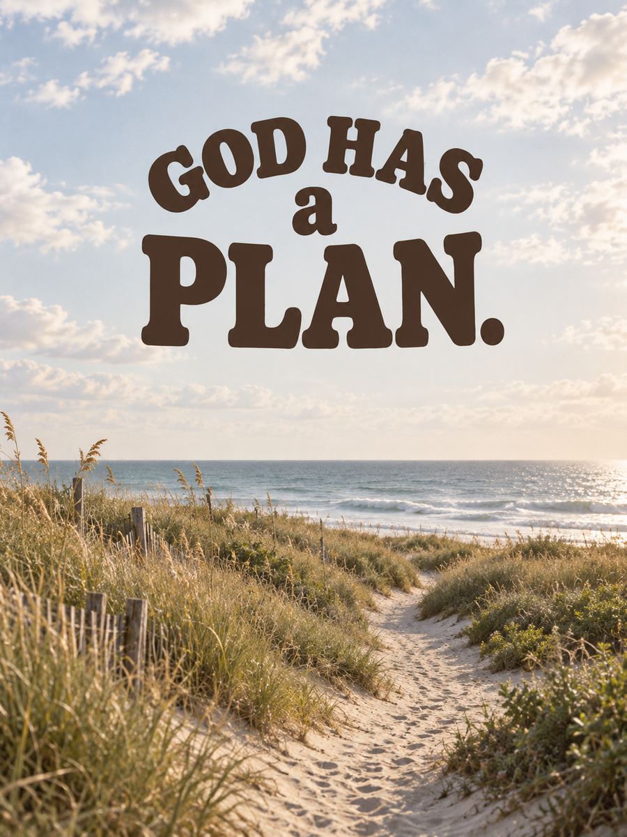 God Has a Plan in chocolate brown lettering above a quiet coastal path through dune grasses