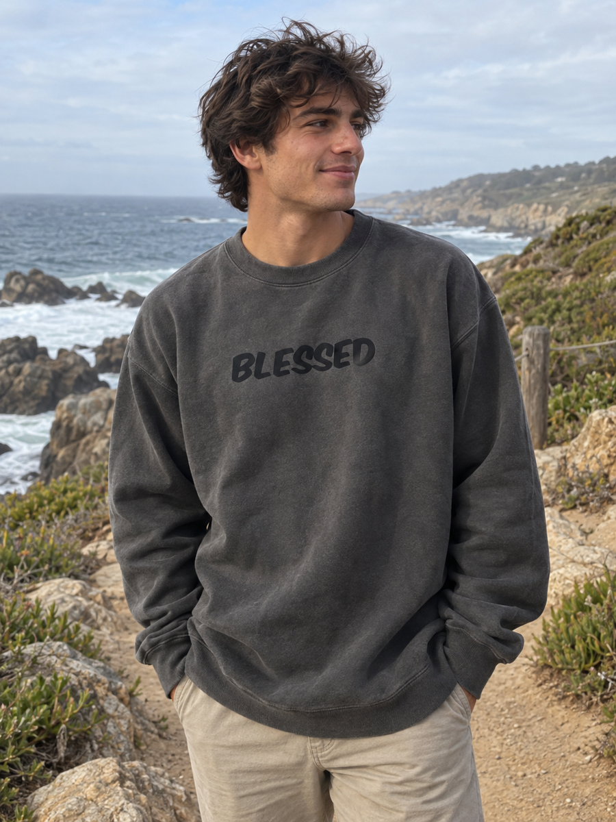 Blessed Unisex Pigment-Dyed Crewneck Sweatshirt — Man on rocky coastal path