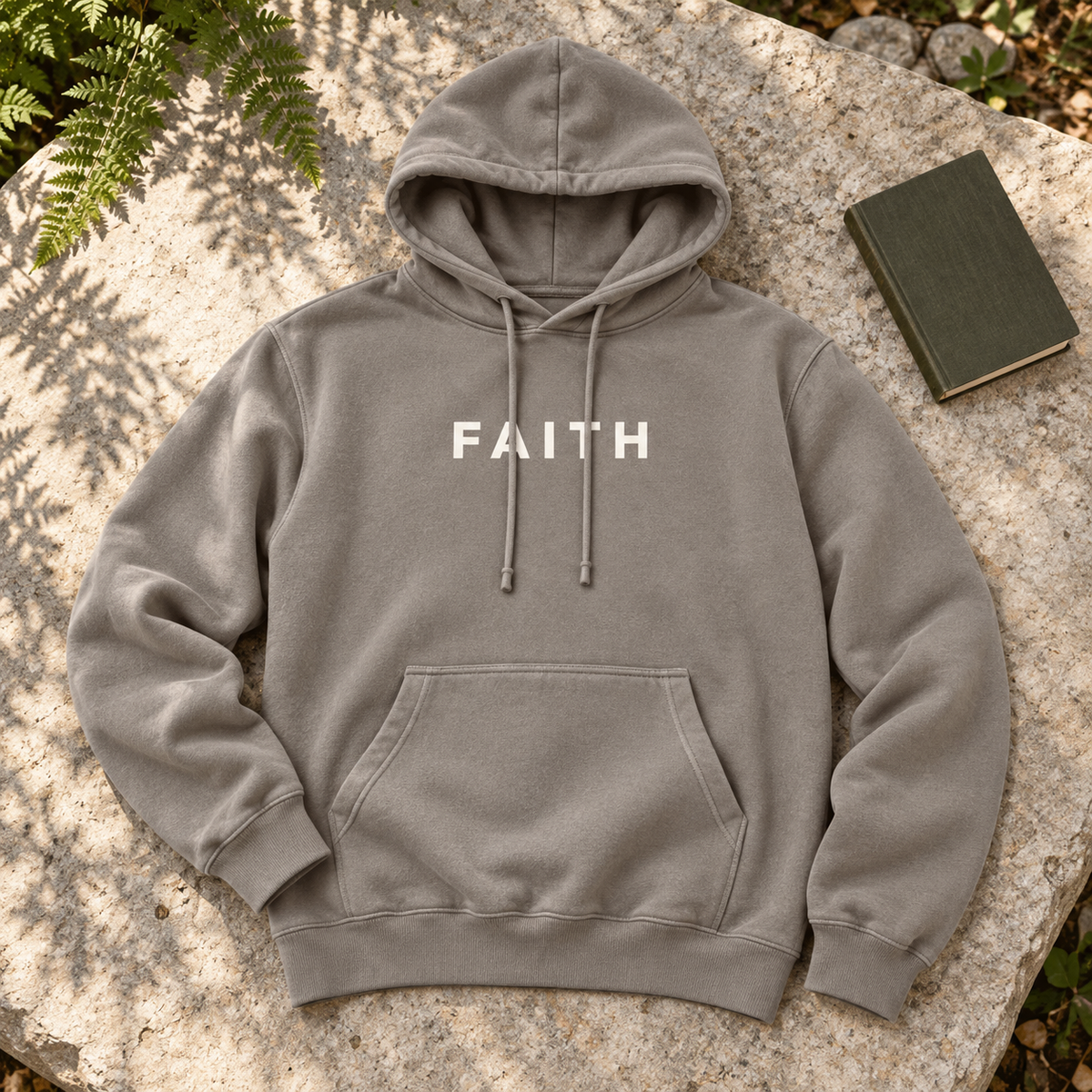 washed gray-taupe hoodie with white spaced uppercase FAITH centered chest — square editorial flat lay