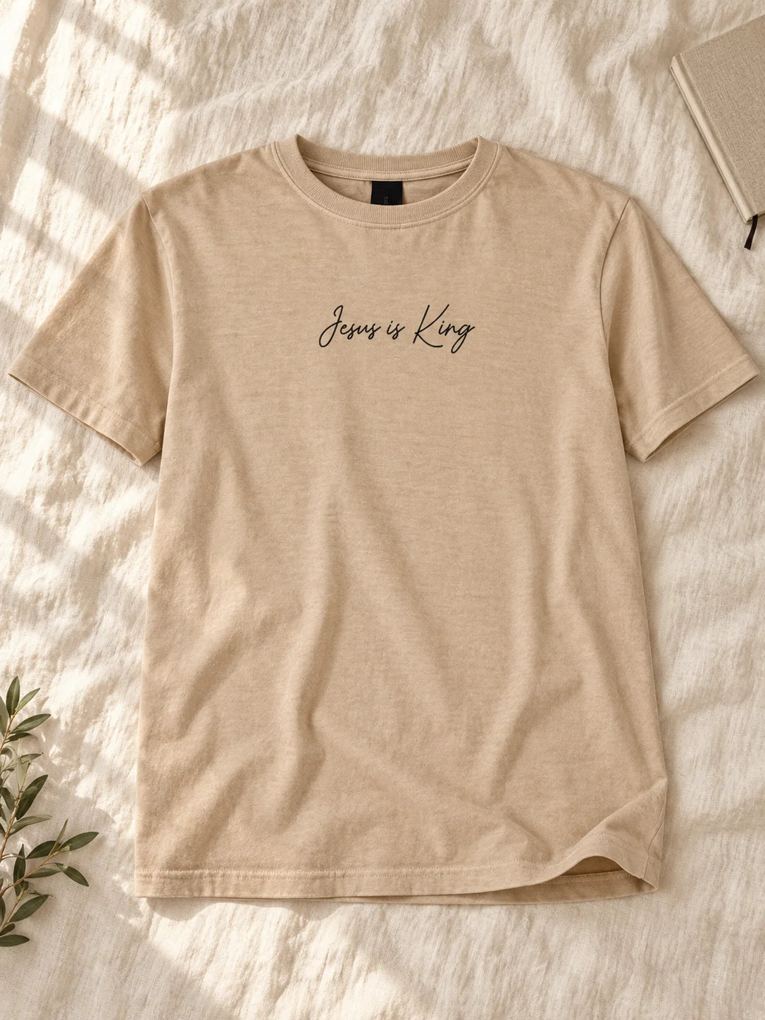 king flatlay — AI-styled flat lay of the tee