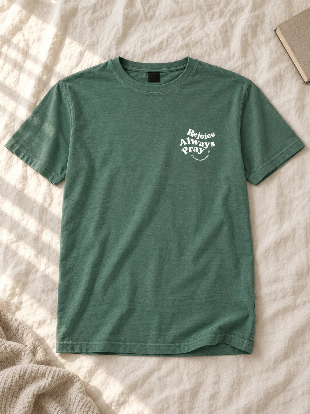 rejoice flatlay — AI-styled flat lay of the tee