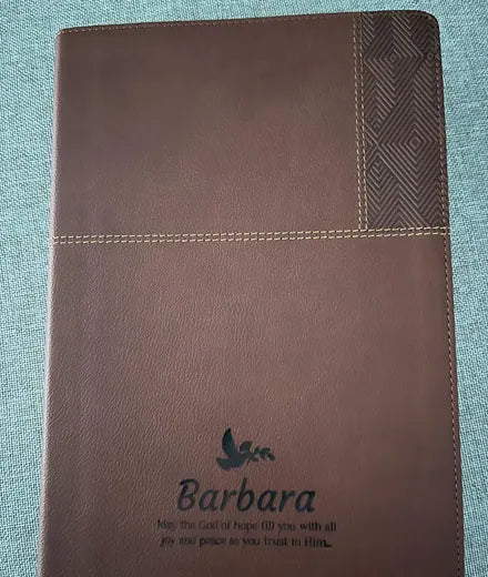 Brown Bible personalized with a name and dove