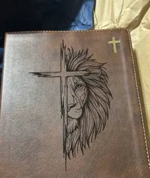 Brown Bible personalized with a cross and lion design