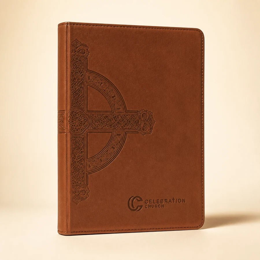 Brown Bible personalized with a large Celtic cross and church campus logo
