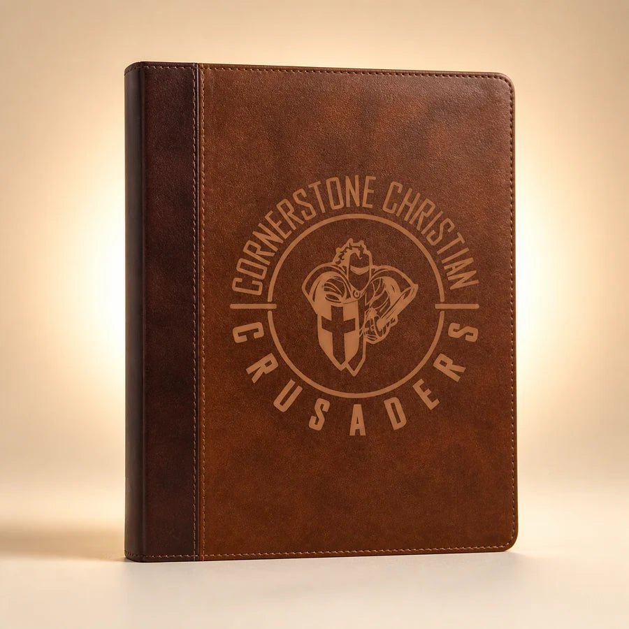 Brown Bible personalized with a youth ministry emblem