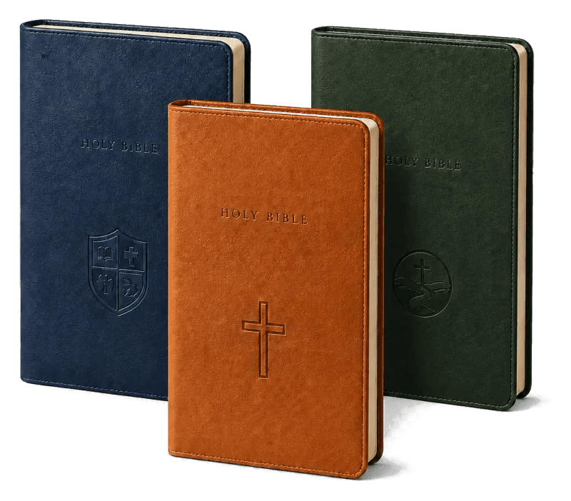 Three personalized Bibles in navy, cognac, and forest green with distinct organization marks