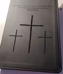 Customer Bible engraved with three crosses