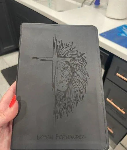 A customer’s black lion and cross Bible