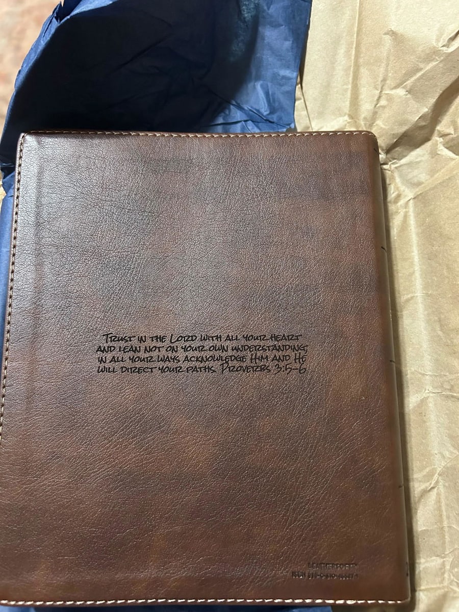 Customer photo shared by Ann O of the NIV Brown Standard Size Notetaking Holy Bible Medium Print | Cross + Lion